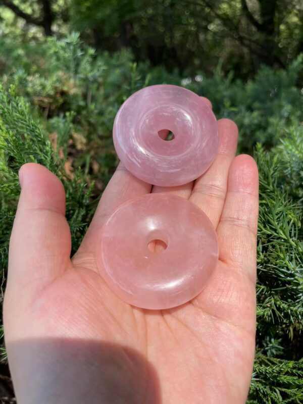 Polished rose quartz donut