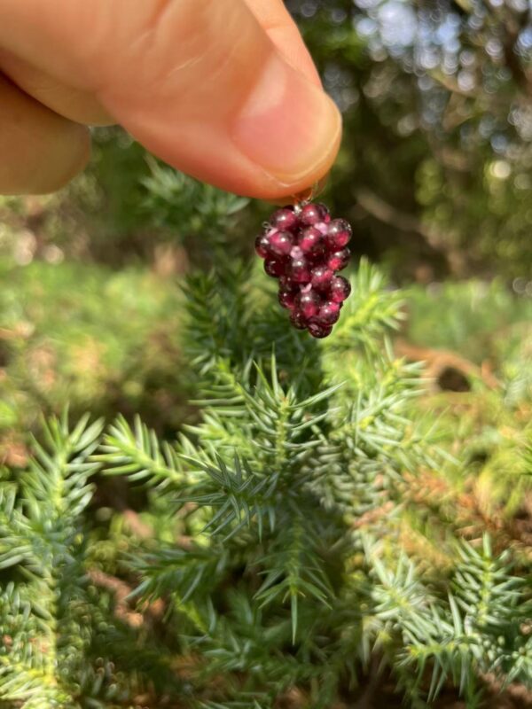 Grape cluster garnet pendant