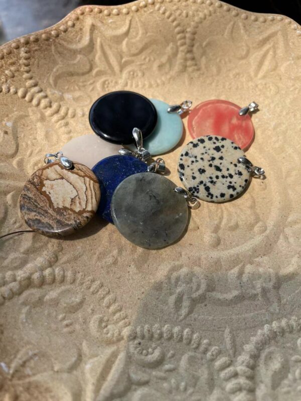 Disc shaped crystal pendant